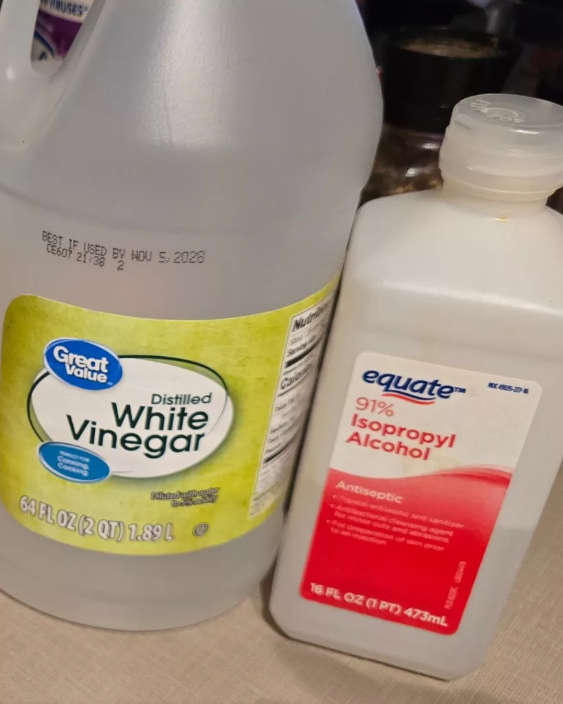 Homemade reusable cleaning wipes stored in a jar, offering eco friendly and low energy cleaning tips.